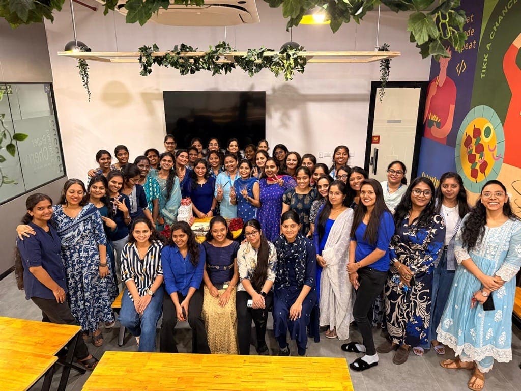 The women of Praval gathered together in the office for Women's Day